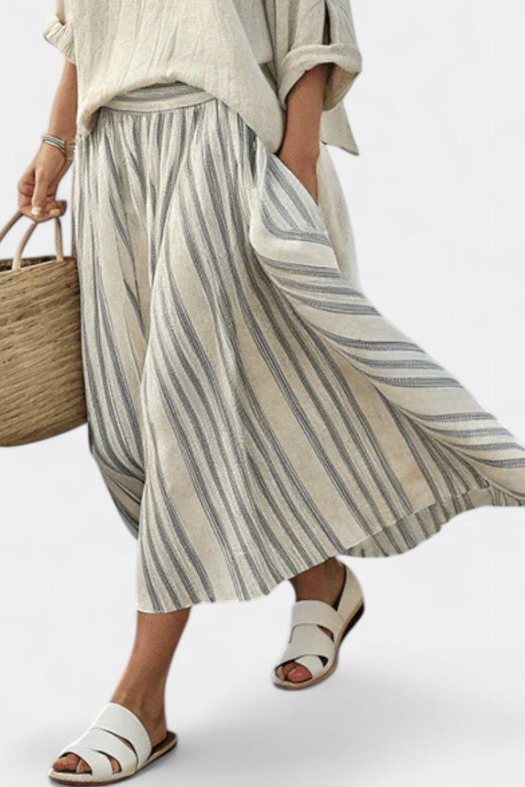 Gia | comfortable blouse and striped midi skirt