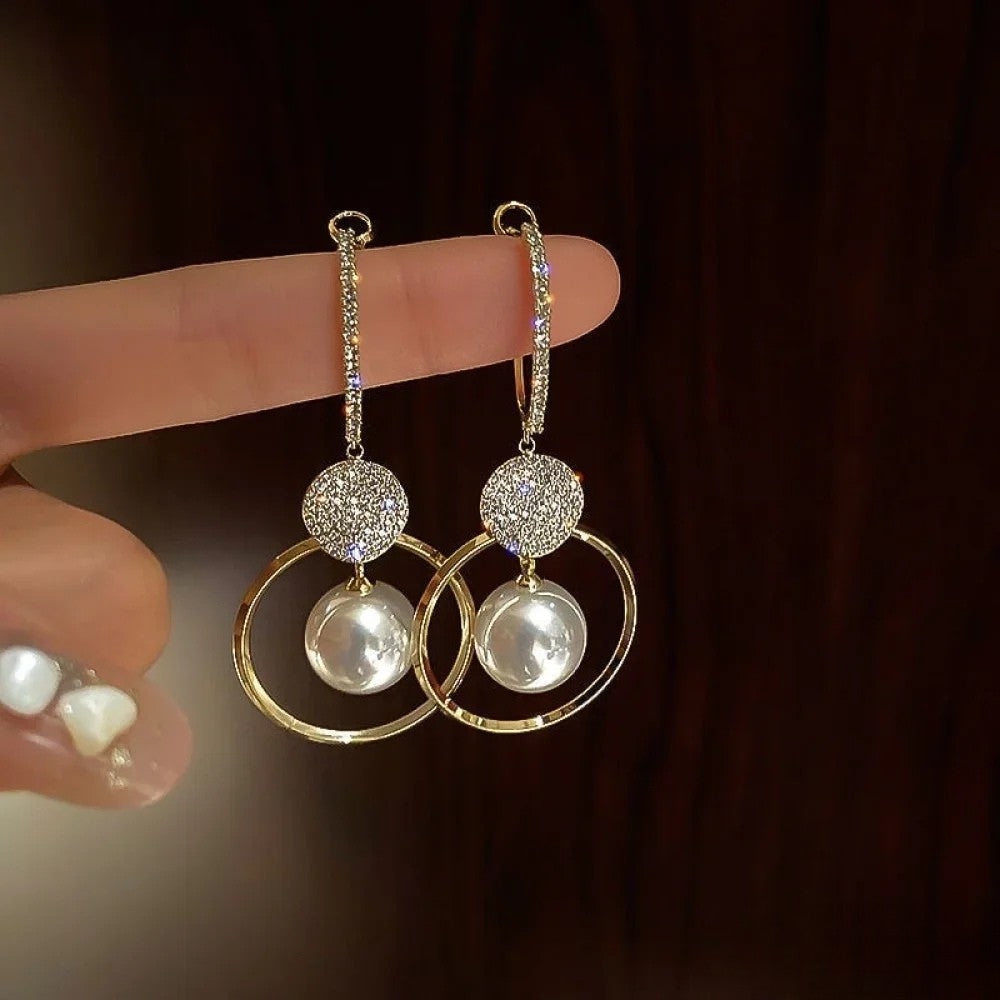 Xavia | Elegant Earrings with Pearl Details and Sparkling Zirconia