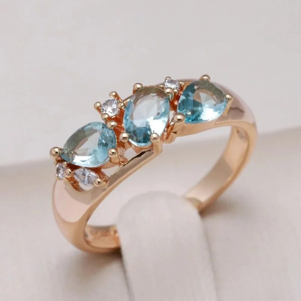 Kira | Gold-Tone ring with blue zirconia