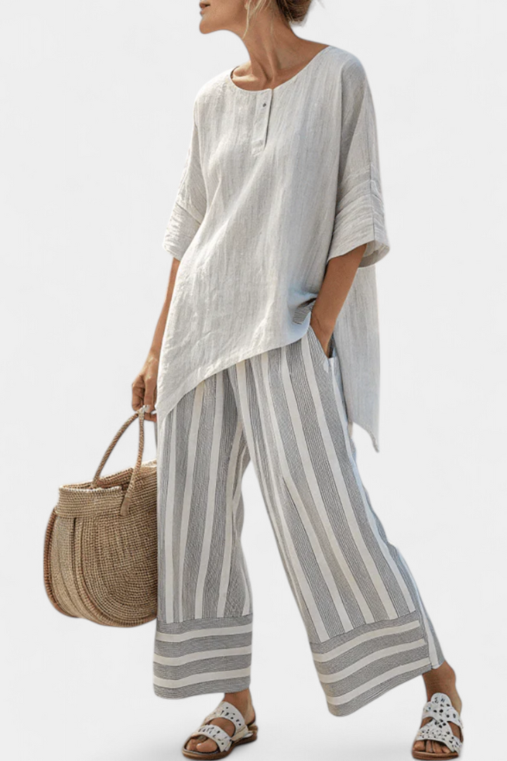 Elle | Elegant Asymmetric Blouse and Striped Trousers