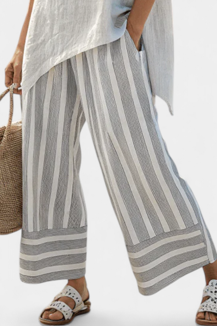 Elle | Elegant Asymmetric Blouse and Striped Trousers